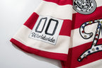 MAJESTIK Striped Crest Graphic Polo Shirt ¡ª detail